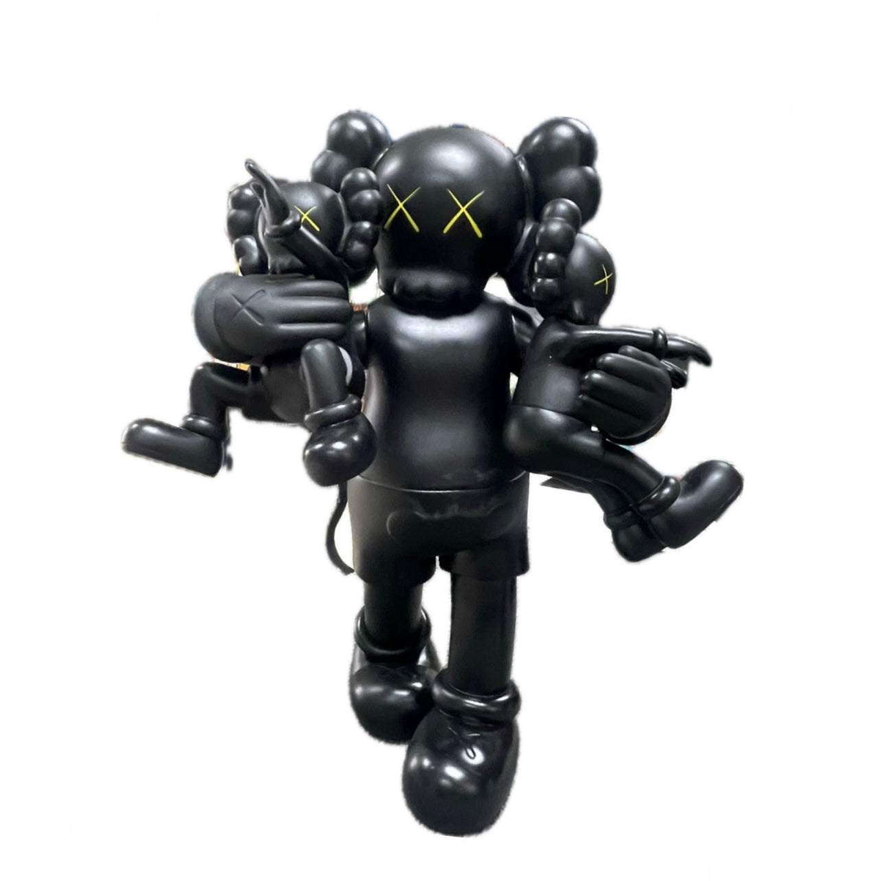 KAWS NEGRO TRIO, NIÑOS CARGADOS